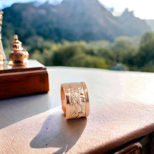 Front view of artisan silver wrinkled copper adjustable ring