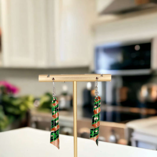 Close-up of the copper texture on handcrafted artisan green auger copper earrings
