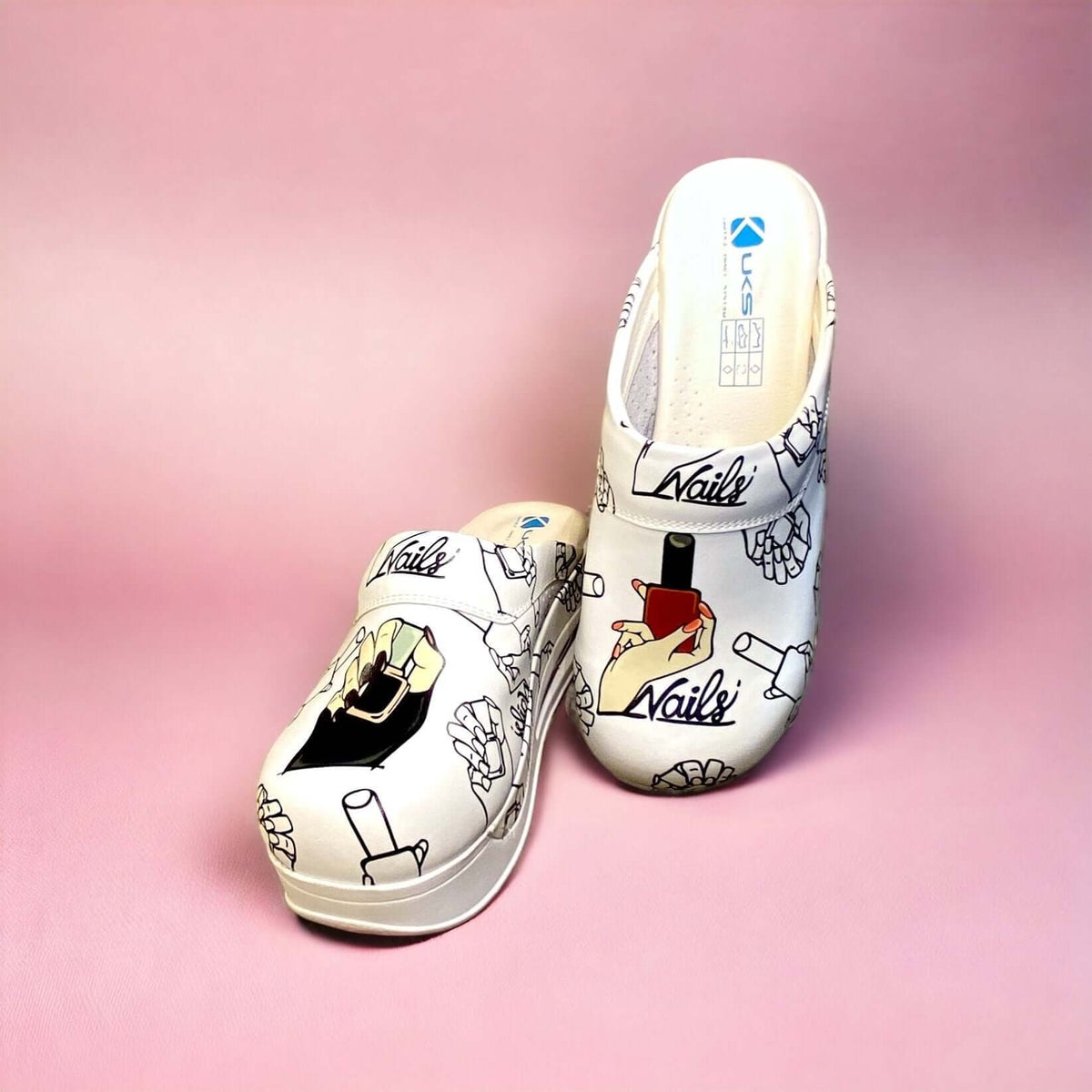 Side profile of handmade nail pattern leather clogs with an Air Clogx sole