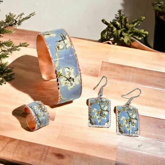 The full three-piece Van Gogh Almond Blossom copper jewellery set laid flat