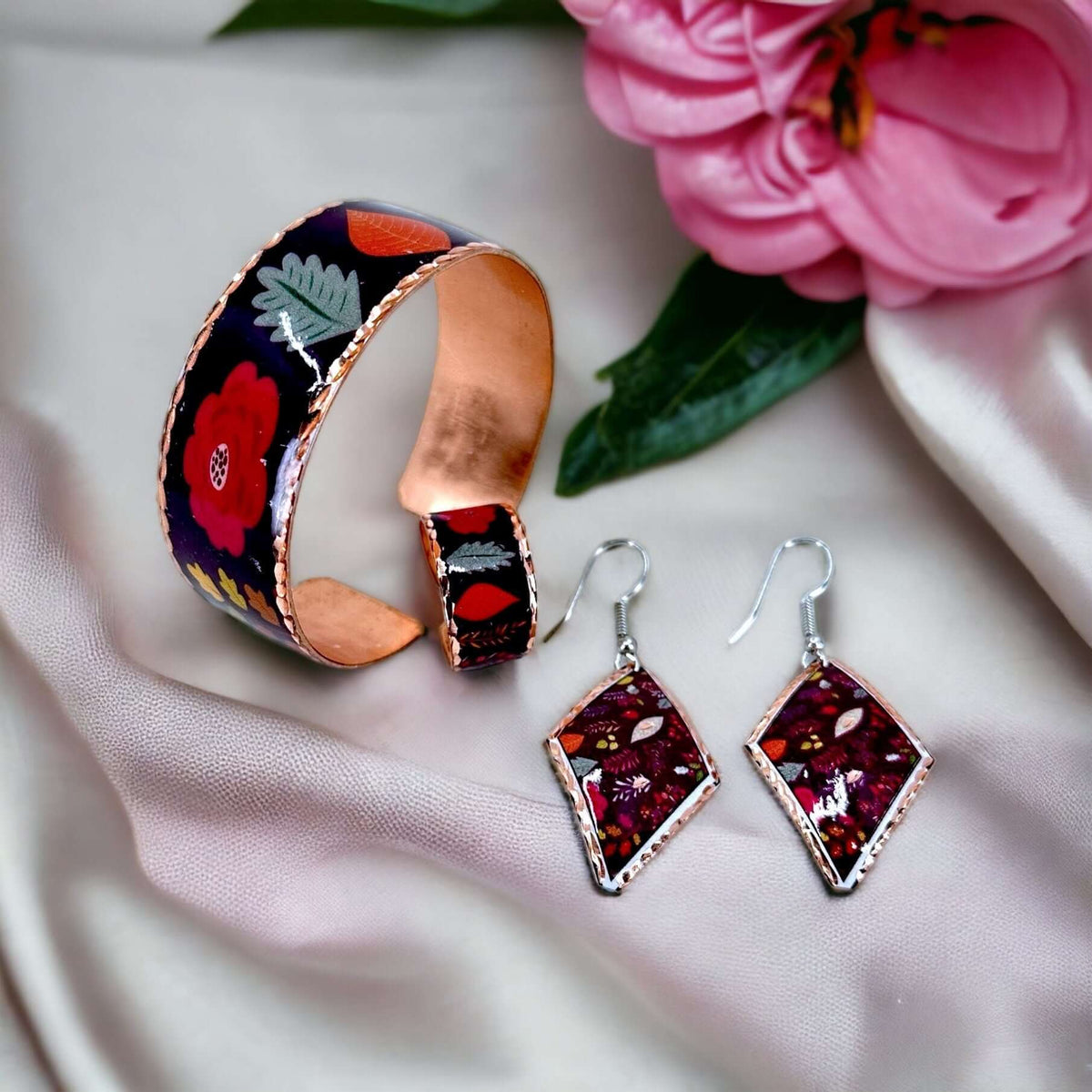 Front view of purple flowers copper jewellery set