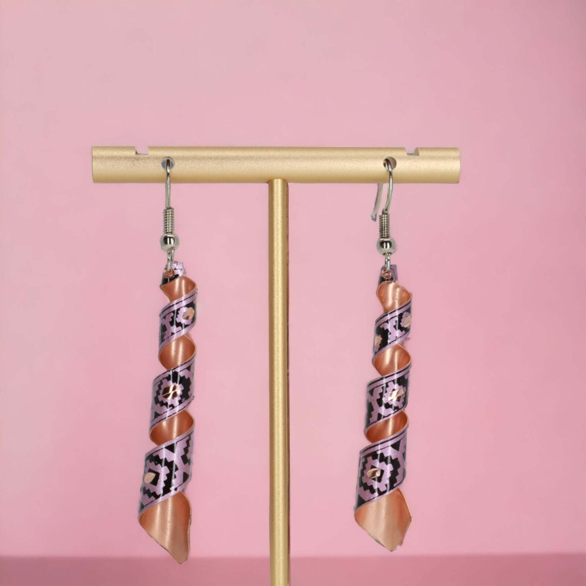 Close-up of the copper texture on handcrafted artisan pink auger copper earrings
