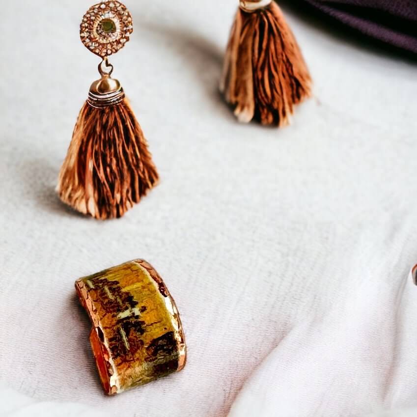 Top-down view of Van Gogh Café Terrace at Night copper jewellery set