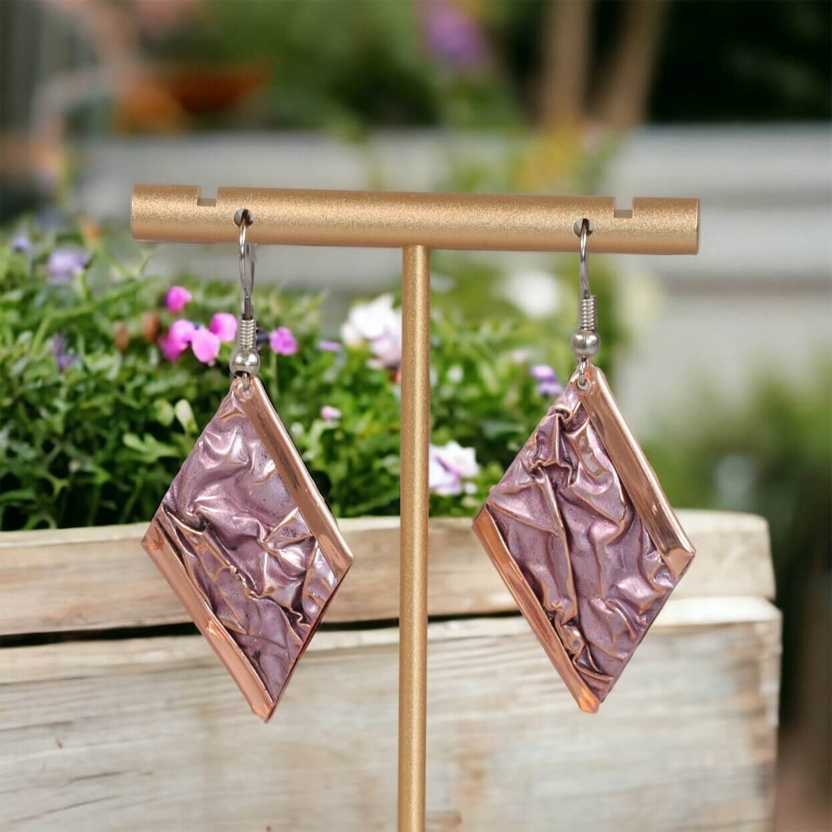 Close-up of the copper texture on handcrafted artisan wrinkled copper earrings
