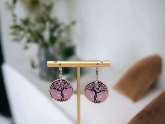 Front view of handcrafted lavender tree copper circle earrings