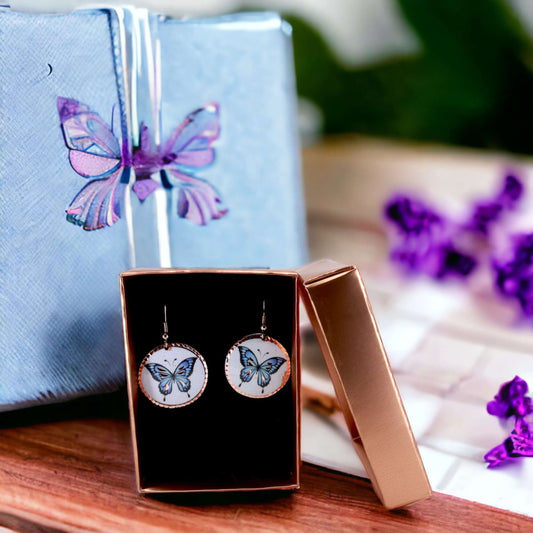 Front view of handcrafted butterfly copper circle earrings