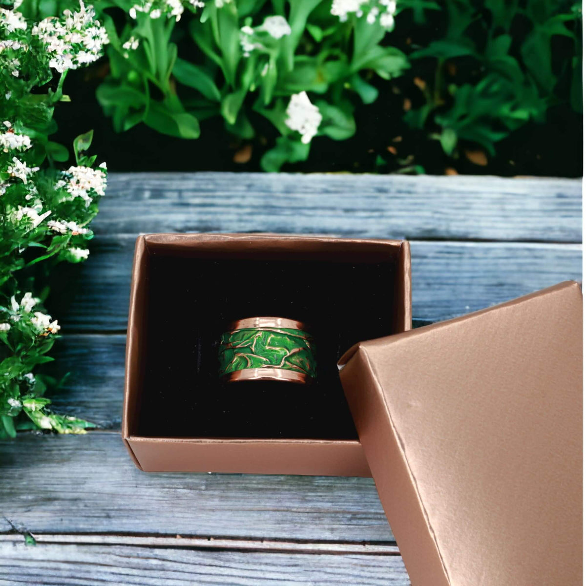 Front view of handmade green wrinkled copper adjustable ring