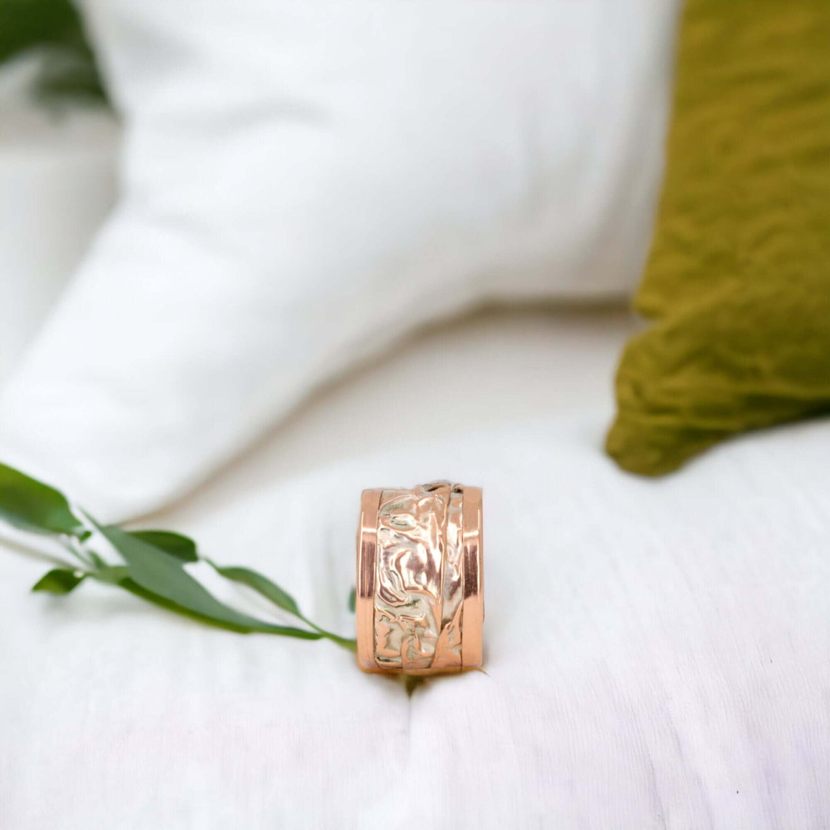 Side angle of artisan silver wrinkled copper adjustable ring