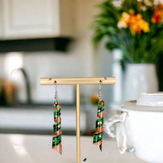 Front view of handcrafted artisan green auger copper earrings
