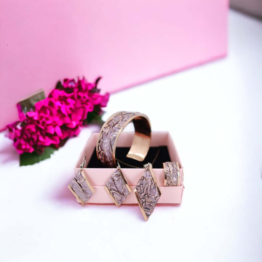 The full pink wrinkled copper jewellery set in style 01 laid flat