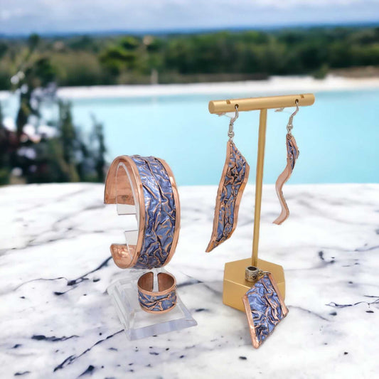Front view of handcrafted blue wrinkled copper jewellery set