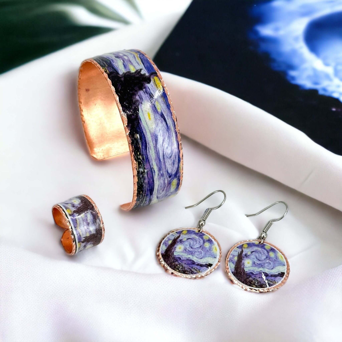 The full three-piece Van Gogh Starry Night copper jewellery set laid flat