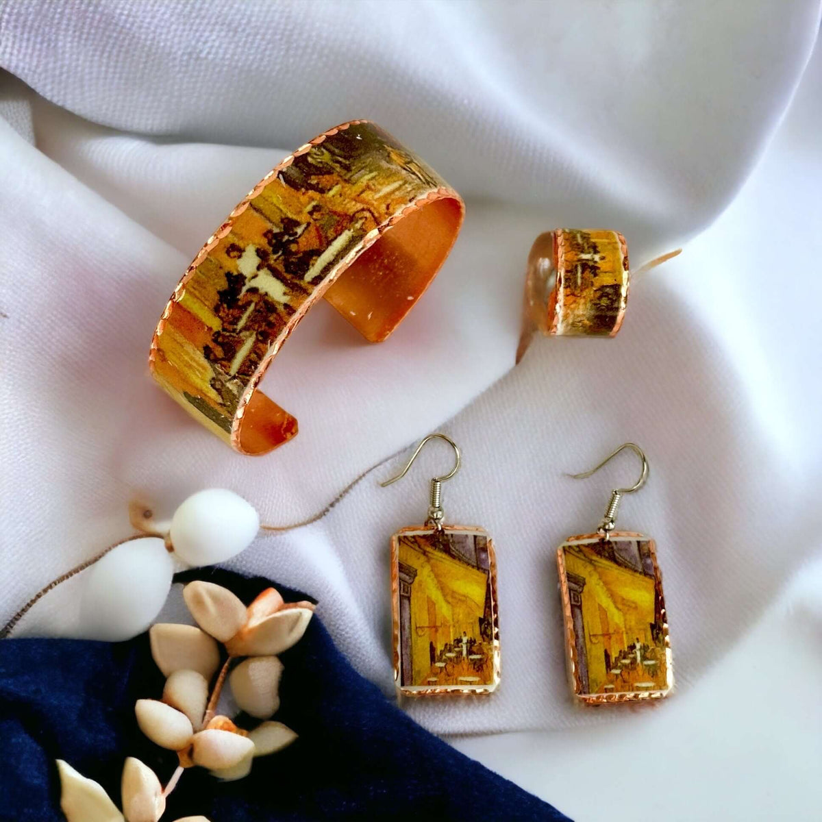The full Van Gogh Café Terrace at Night copper jewellery set laid flat