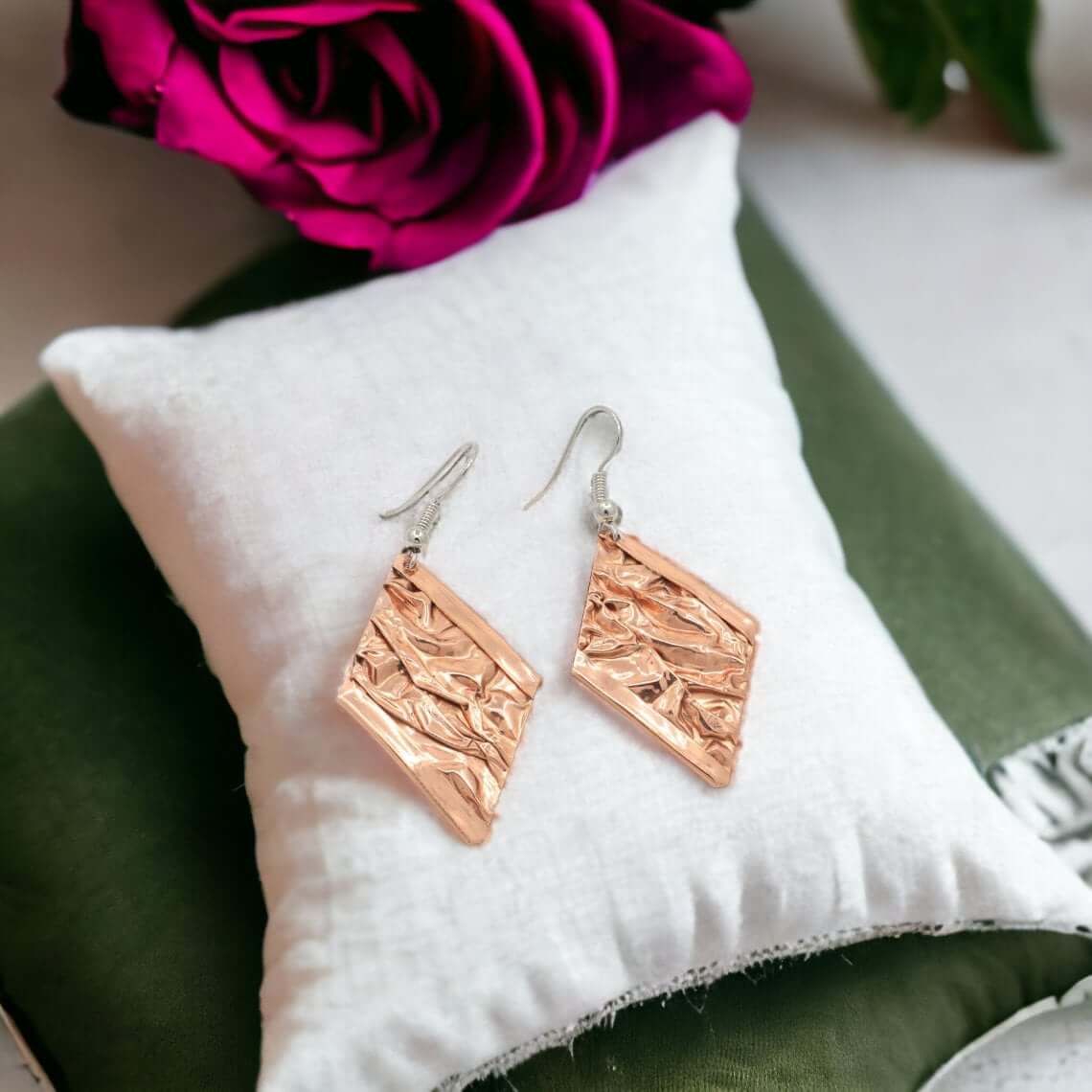 Ring from the handcrafted wrinkled copper jewellery set worn on the finger