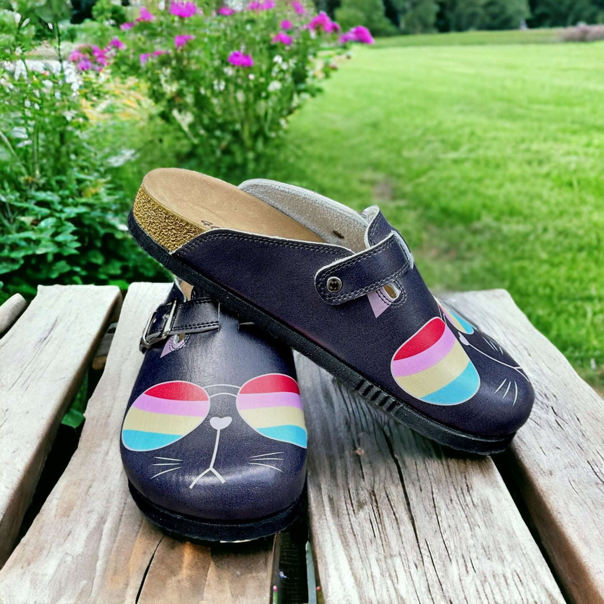 Angled three-quarter view of orthopedic cat glasses leather clogs with a cork sole
