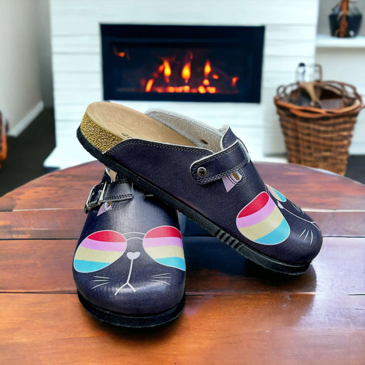 Side profile of orthopedic cat glasses leather clogs with a cork sole