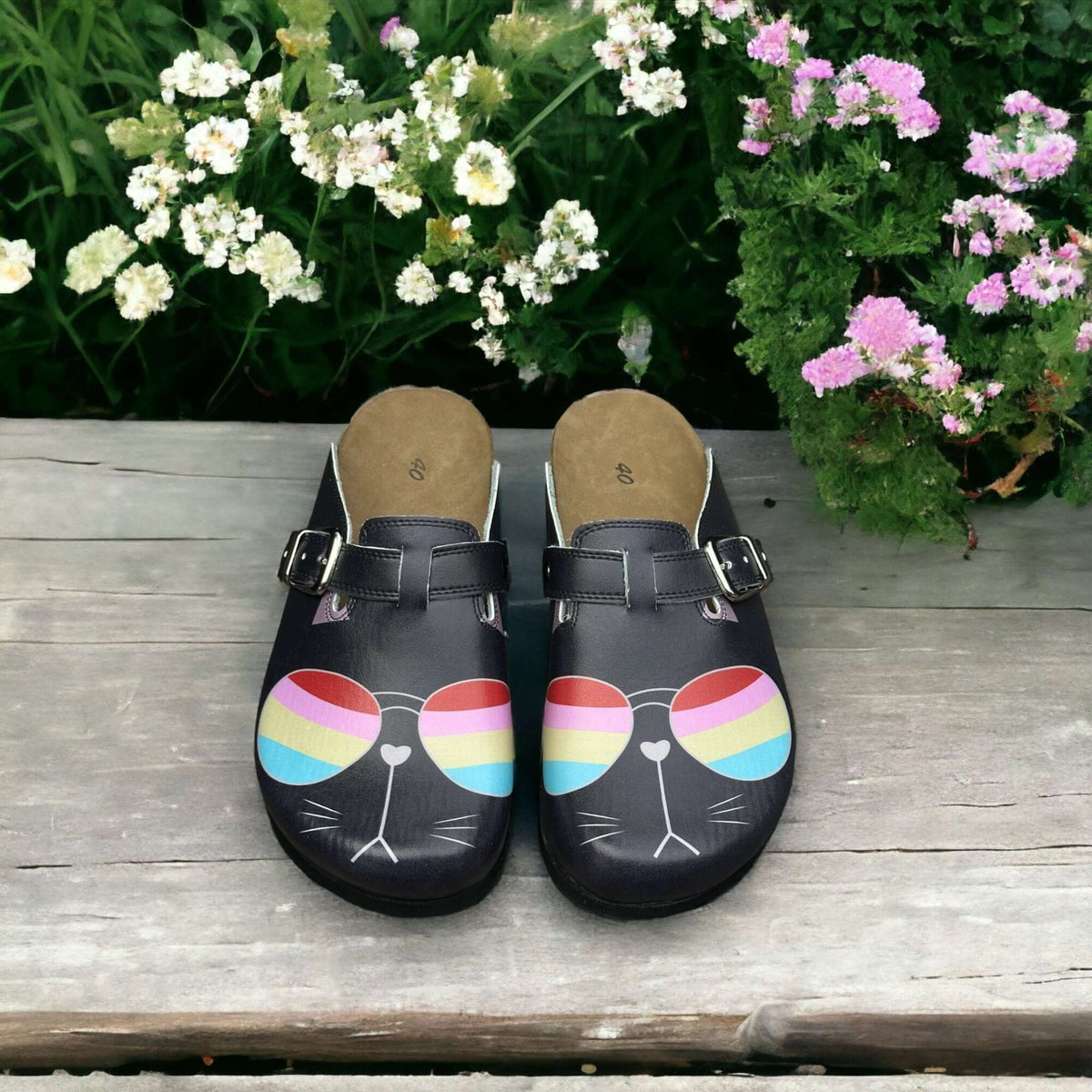 Close-up of the printed design on orthopedic cat glasses leather clogs with a cork sole